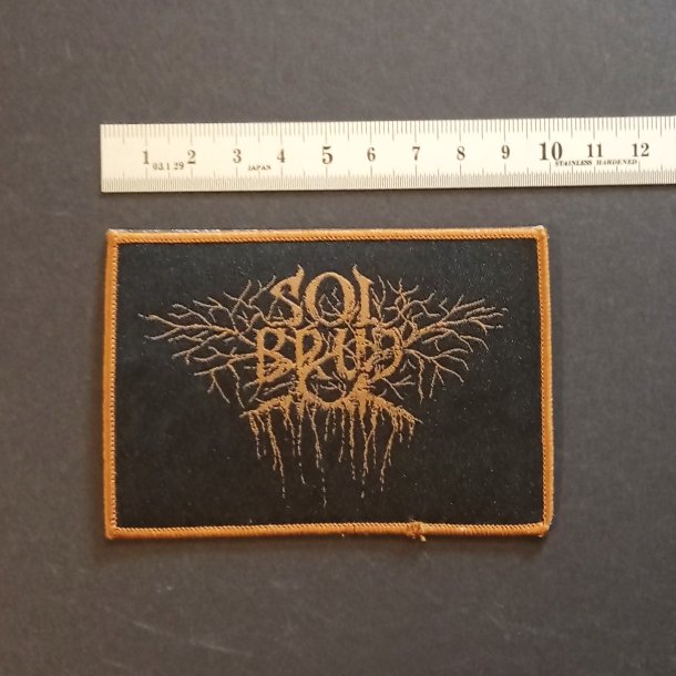 Solbrud gold logo patch 